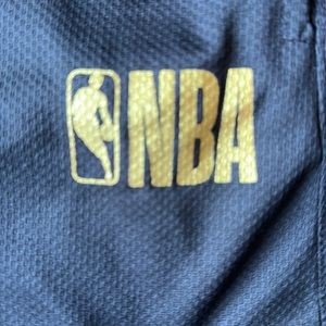 Black and gold NBA basketball shorts